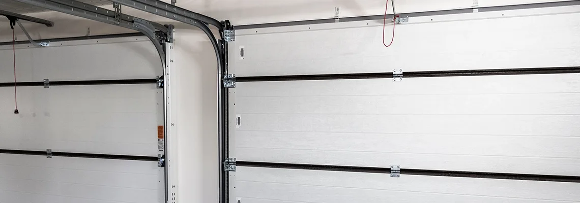 Fix Folding Garage Door Jerking in Moncton, New Brunswick