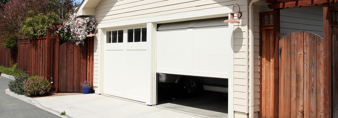 Fix Metal Garage Door Jerking in Moncton, New Brunswick